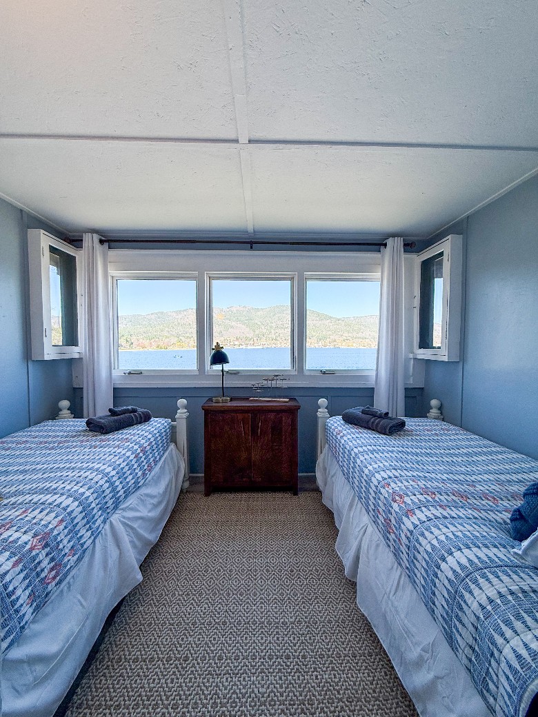 Second level bedroom with gorgeous views and two twin beds