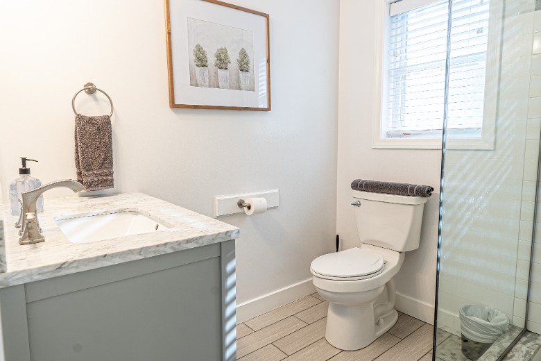 Main Level Bathroom with a spacious shower.