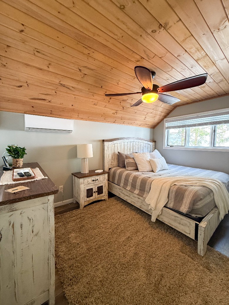 Top Level King Bedroom w/dresser for clothing storage.  This bedroom is next door to the top-level bathroom.