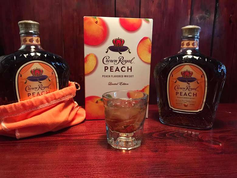 Crown Royal peach bottles and drink