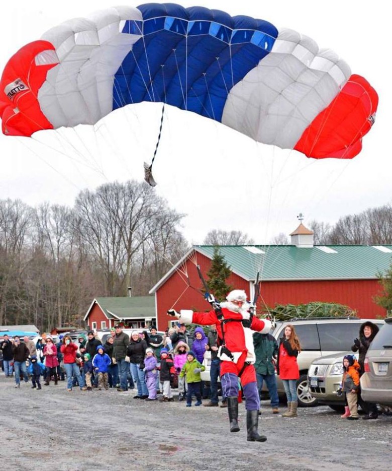 Santa even parachutes into the farm each year on a special day! santa parachuting