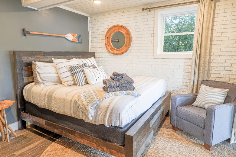 Lower Level King bedroom.  Walk out onto the patio with a private entrance.  Stunning lake views.