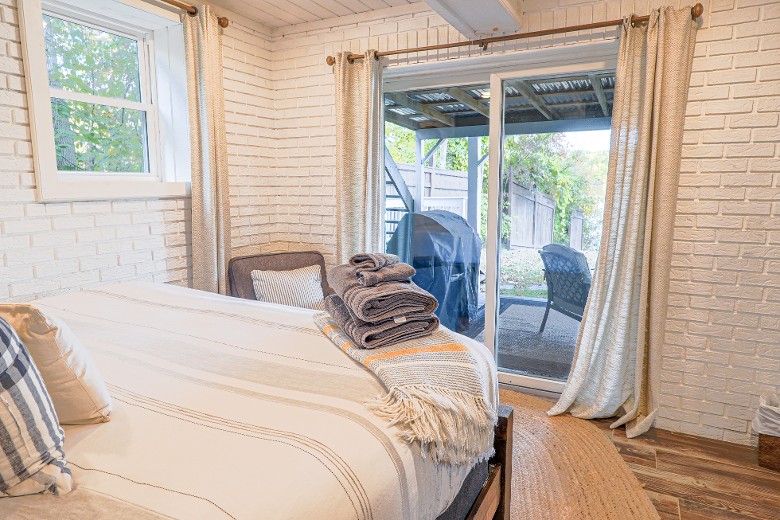 Lower Level King bedroom.  Walk out onto the patio with a private entrance.  Stunning lake views.