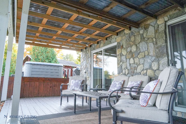 Covered outdoor seating area  There&rsquo;s a BBQ available for outdoor cooking. Located conveniently next to the hot tub area as well as a view of the lake