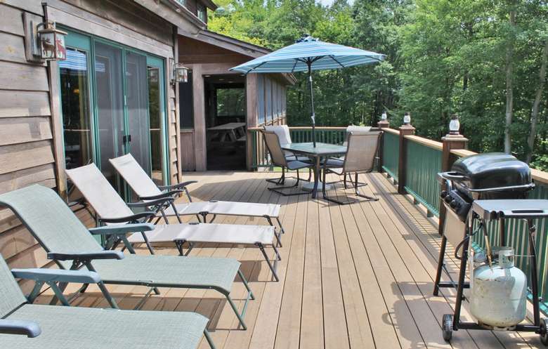 sun chairs on a spacious patio deck