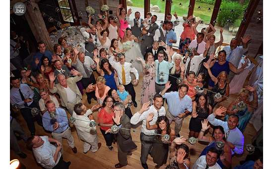 large crowd of people at a wedding party
