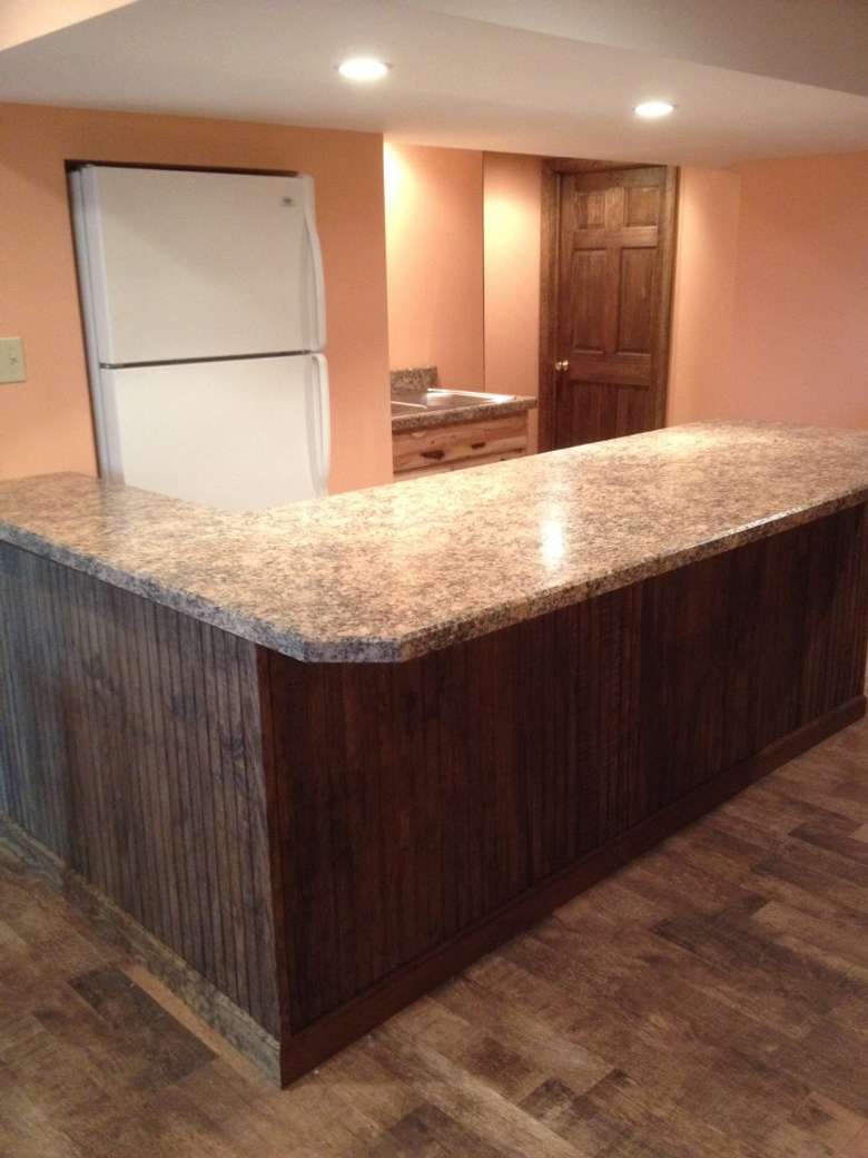 an empty countertop in a kitchen area that is being built