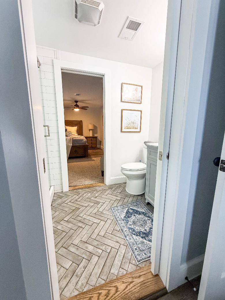 Main level bathroom, with a shower, located between king bedroom and a queen bedroom.