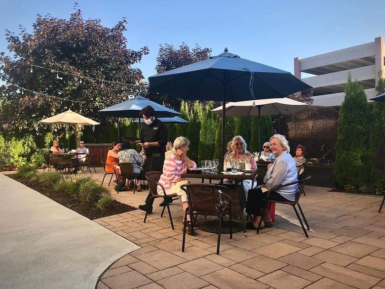 people dining on a patio