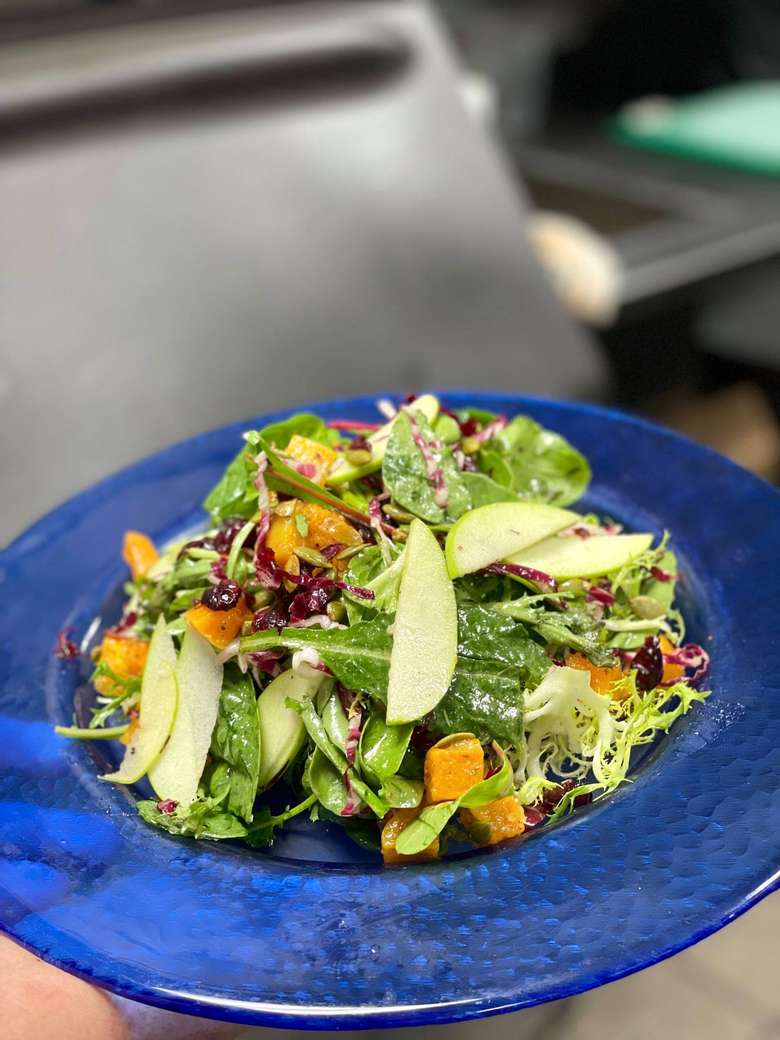 salad on a blue plate