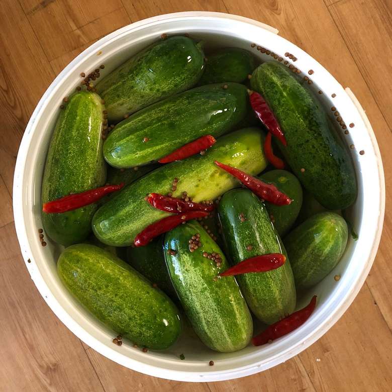 bowl with cucumbers in brine
