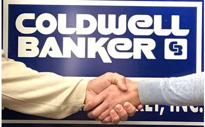coldwell banker logo and handshake
