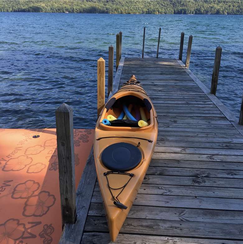 yellow kayak on a boat dock
