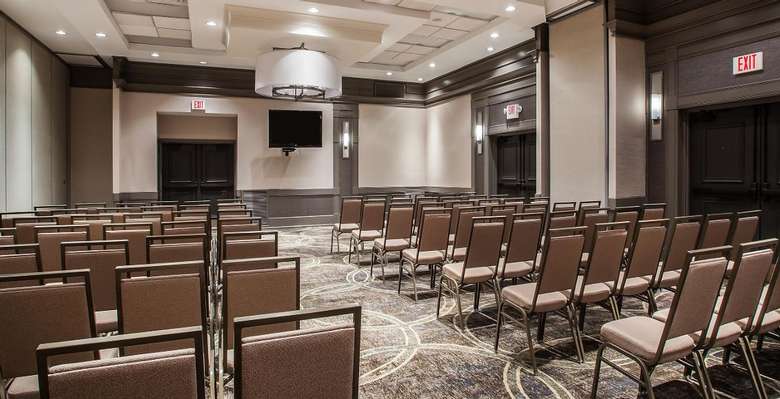 large conference room with chairs for the audience