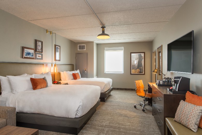 Bedroom in a Hotel Saranac suite inspired by Adirondack great camps, Saranac Lake NY