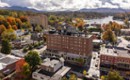 Daytime exterior of Hotel Saranac in fall, historic hotel in Saranac Lake NY