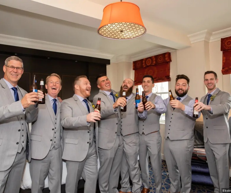 Groom and groomsmen getting ready at Hotel Saranac in Saranac Lake NY
