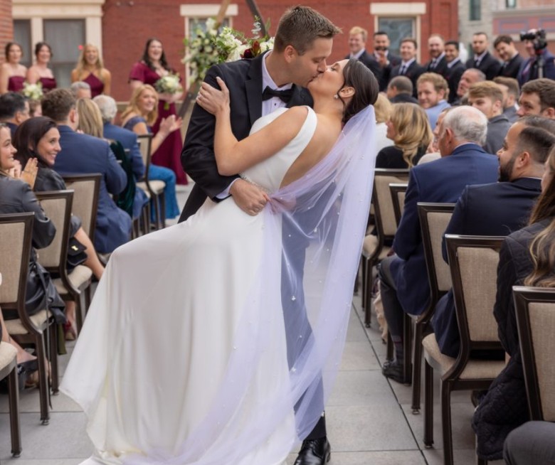 Outdoor wedding ceremony on the terrace at Hotel Saranac in Saranac Lake NY