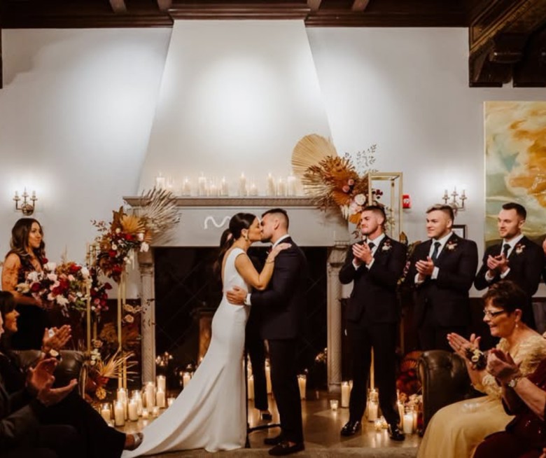 Wedding ceremony in the historic Great Hall at Hotel Saranac in Saranac Lake NY