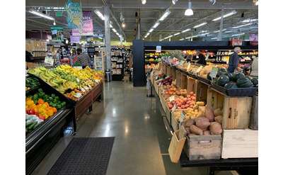 fruits and veggies on display in a market