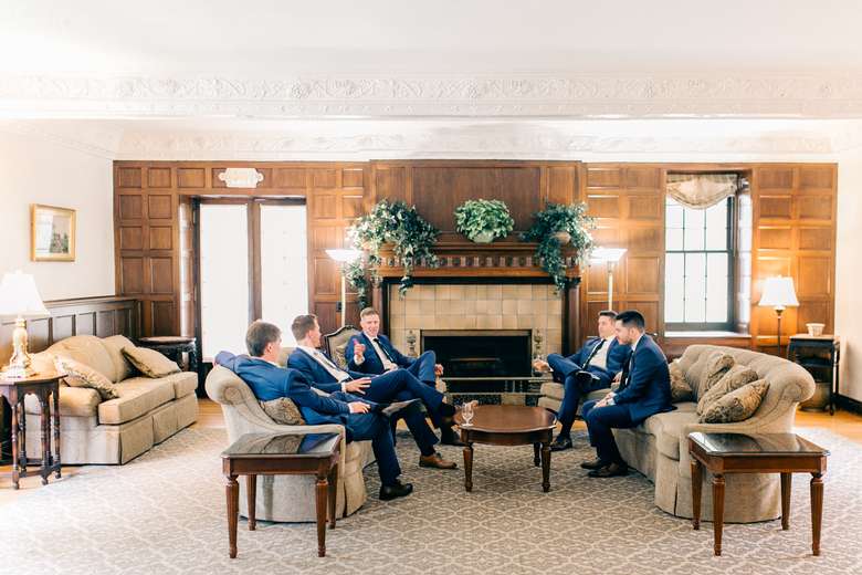 groomsmen waiting in a cozy waiting area