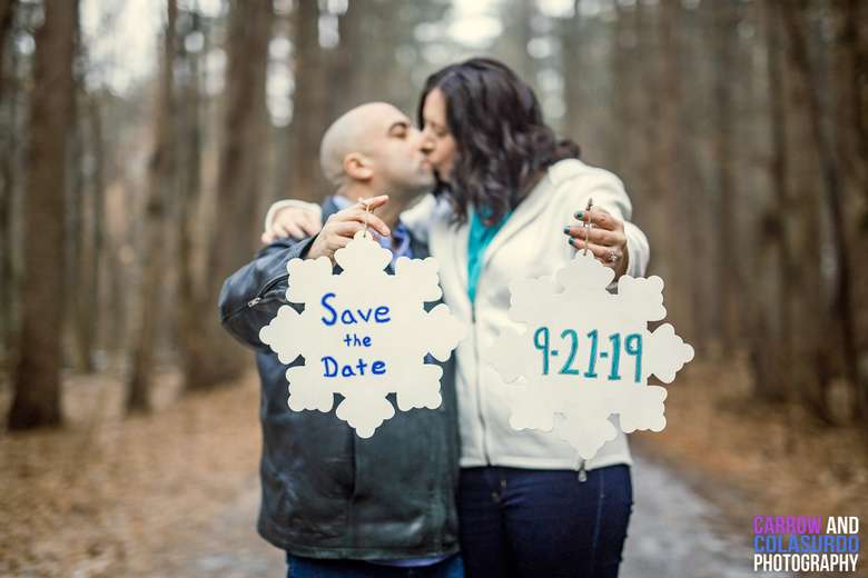save the date kissing photo in woods