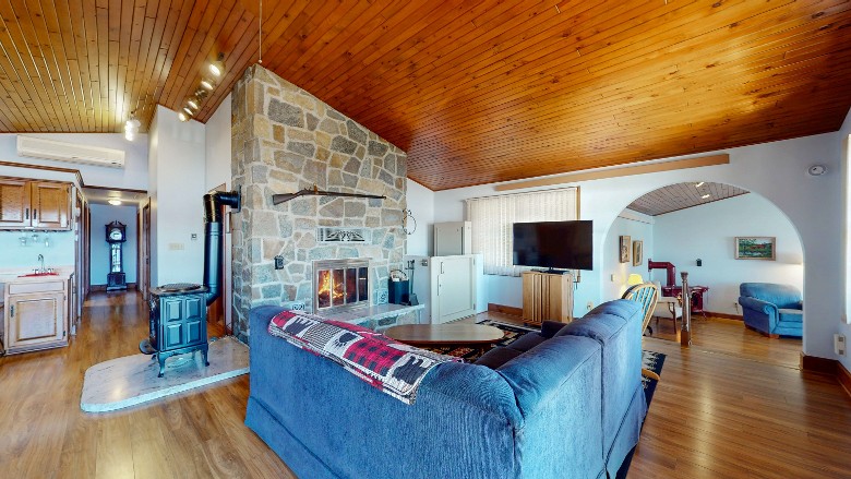Living room with a fire burning in the fireplace