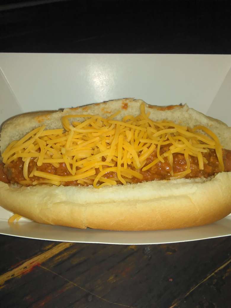 a chili dog with cheese