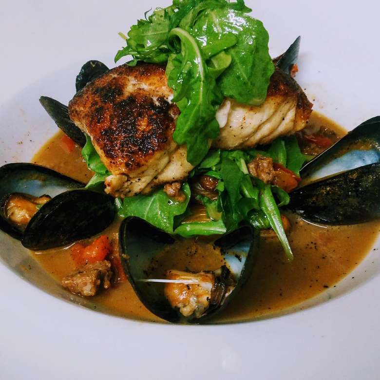 plate of mussels and fish