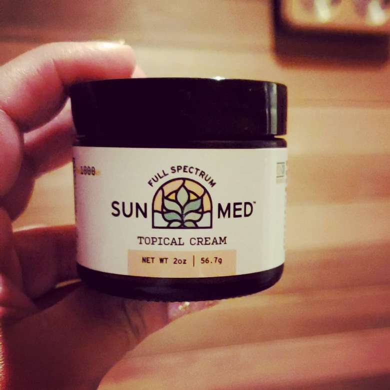 a container of sunmed topical cream