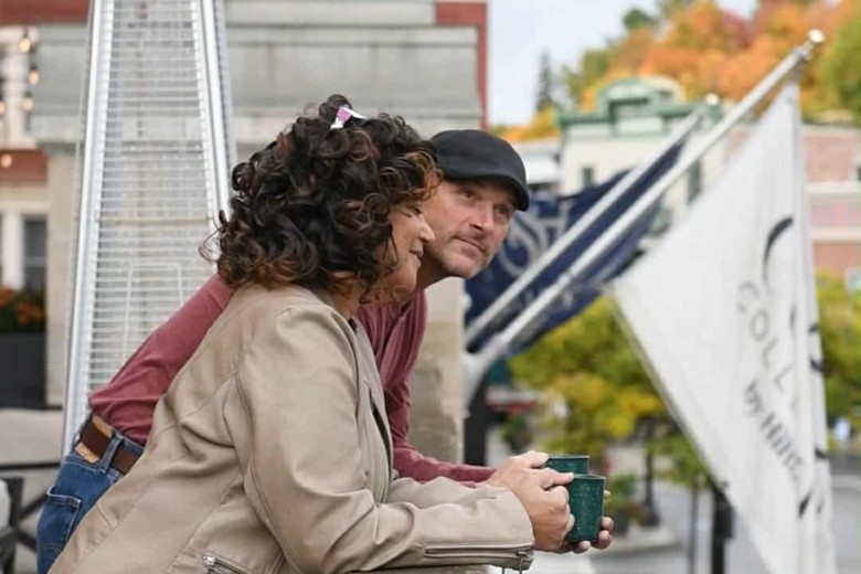 Guests enjoying tea and coffee on the terrace at Hotel Saranac in fall, Saranac Lake NY
