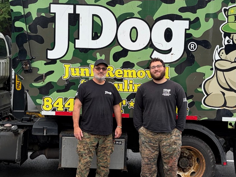 JDog Junk Removal truck and two men