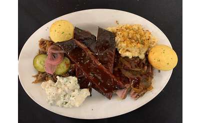 bbq platter with ribs and sides