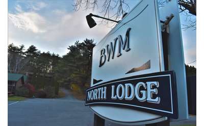 sign that reads BWM north lodge