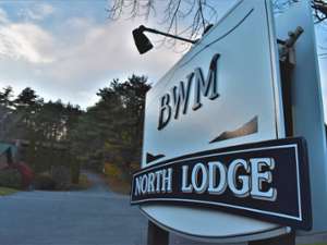 sign that reads BWM north lodge