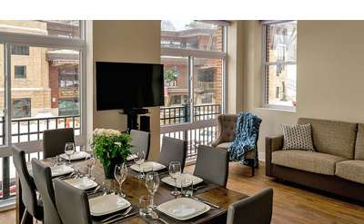 apartment style suite with view of village from windows