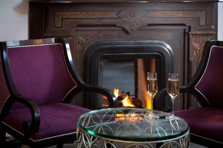 champagne by fireplace
