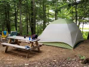 tent set up near picnic table
