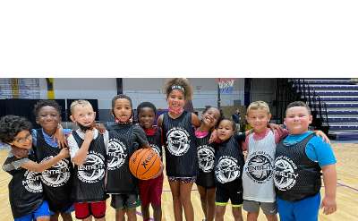 young kids wearing basketball jerseys