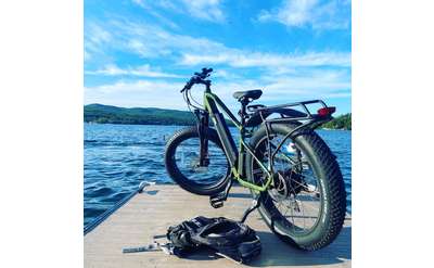 electric bike on a dock by the water