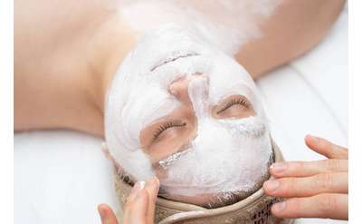 facial treatment on woman