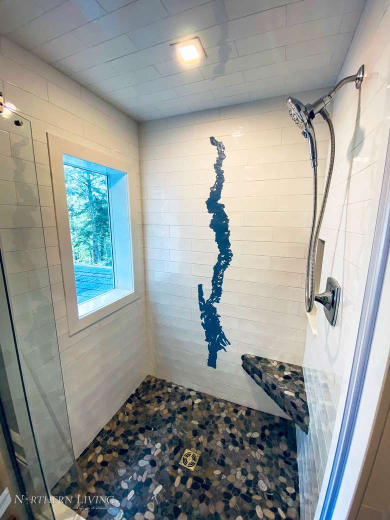 shower with image of lake george on the wall