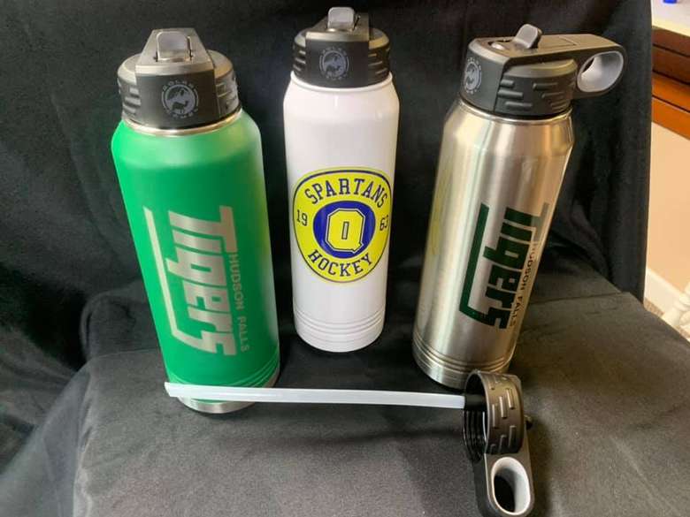 three water bottles with color printed logos