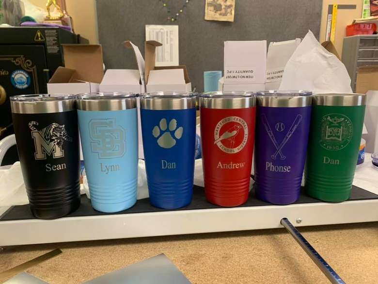 six tumblers with engravings