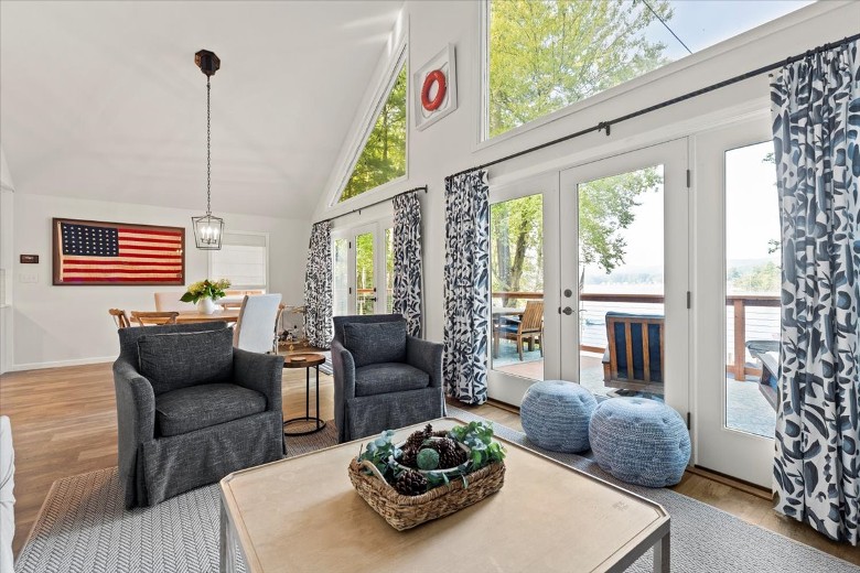 Main level living room, step outside the French doors to the large deck.