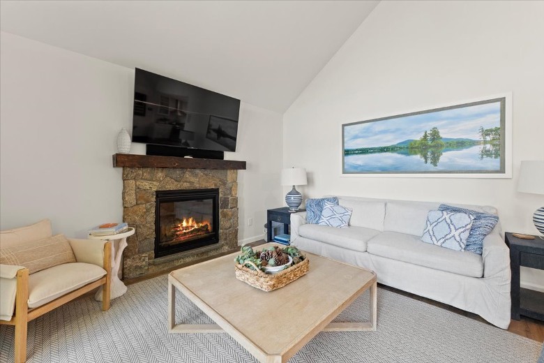 Main level living with fireplace.