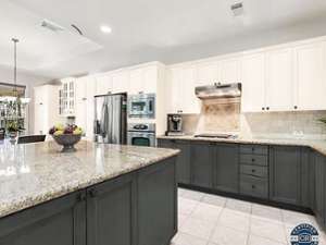 kitchen with white and gray colors