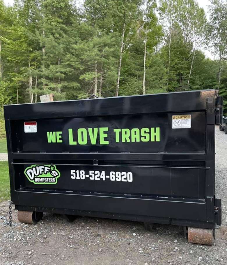 we love trash dumpster