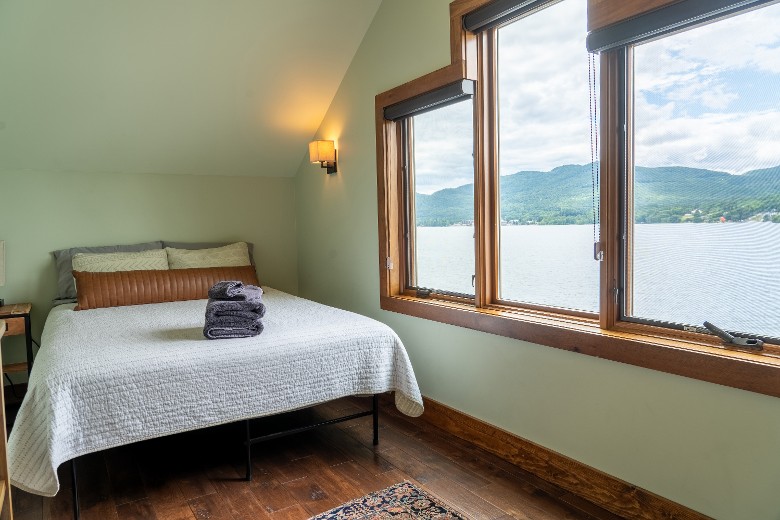 Second-level queen bedroom overlooking Lake George.