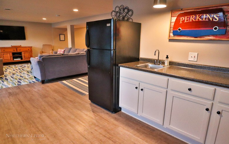 Lake level living space with a wet bar.